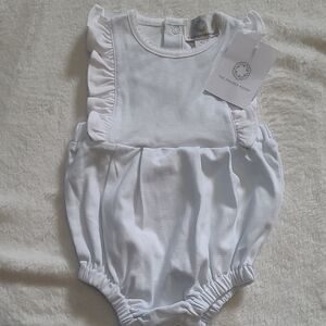 The Proper Peony White Ruffle Baby One-Piece Bodysuit
